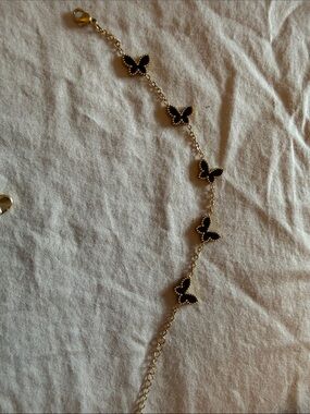 Gold Butterfly Link Bracelet with Black Enamel Accents